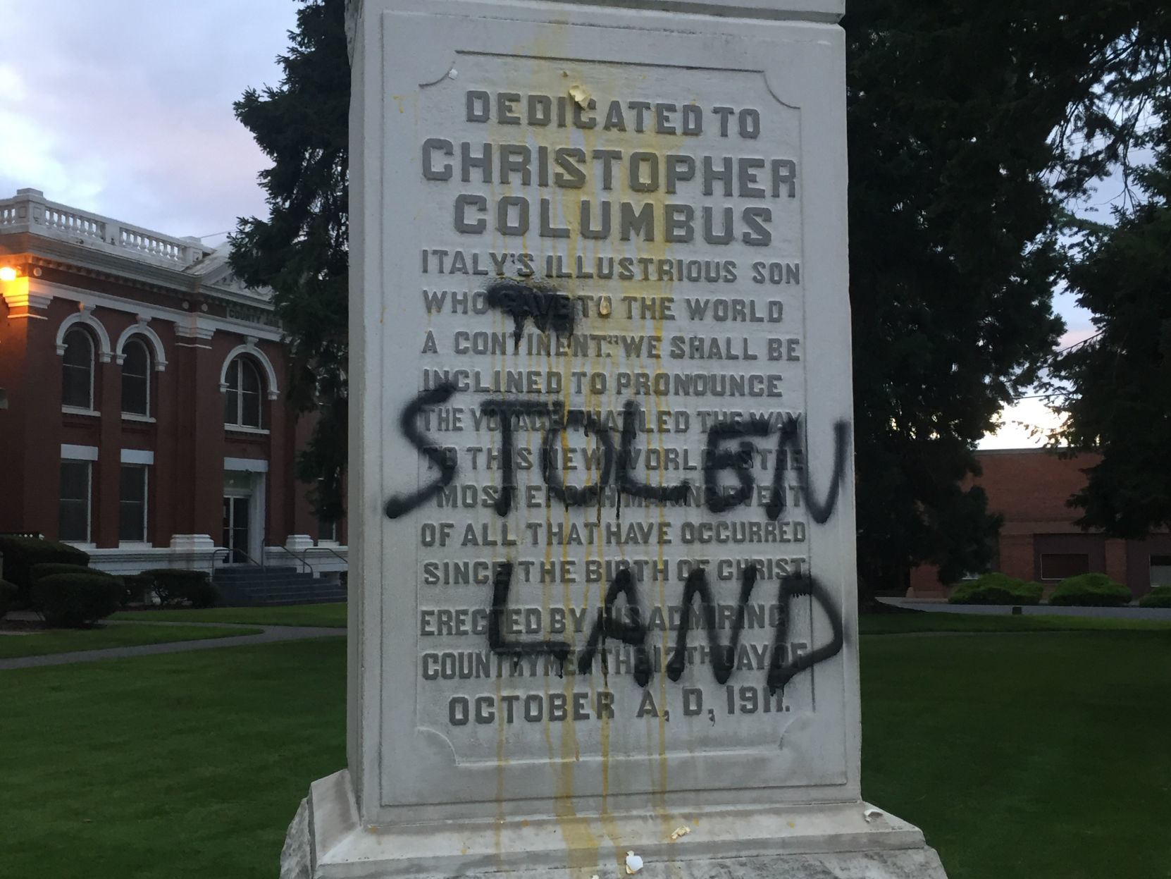 Columbus statue graffiti closeup